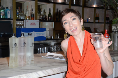Naomi Grossman enjoys refreshments from the Fig&Olive restarant