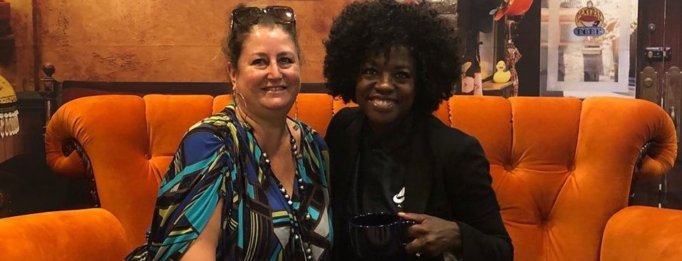 Emmy nominee Viola Davis joins DPA President Nathalie Dubois on the Friends couch at the 2019 DPA Emmy Gifting Lounge