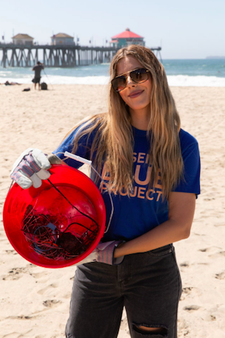 Ashley Wahler joins Shiseido Blue at their beach cleanup in Huntington Beach.