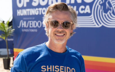 Sam Trammell joins Shiseido Blue in their beach clean up at the 2021 US Open of Surfing in Huntington Beach.
