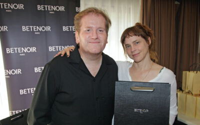 Fiona Dourif receives her gift from Denis Bellaiche of Xions Group at the 2026 DPA Pre-Emmy Awards Gift Suite.