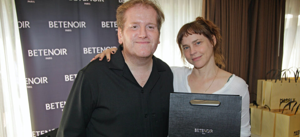 Fiona Dourif receives her gift from Denis Bellaiche of Xions Group at the 2026 DPA Pre-Emmy Awards Gift Suite.